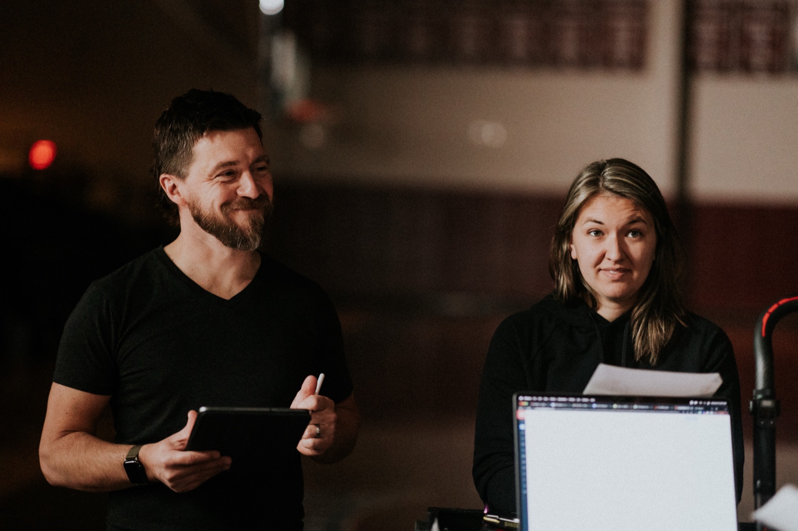 The Tell Studios crew reviewing a shot on location for COACH