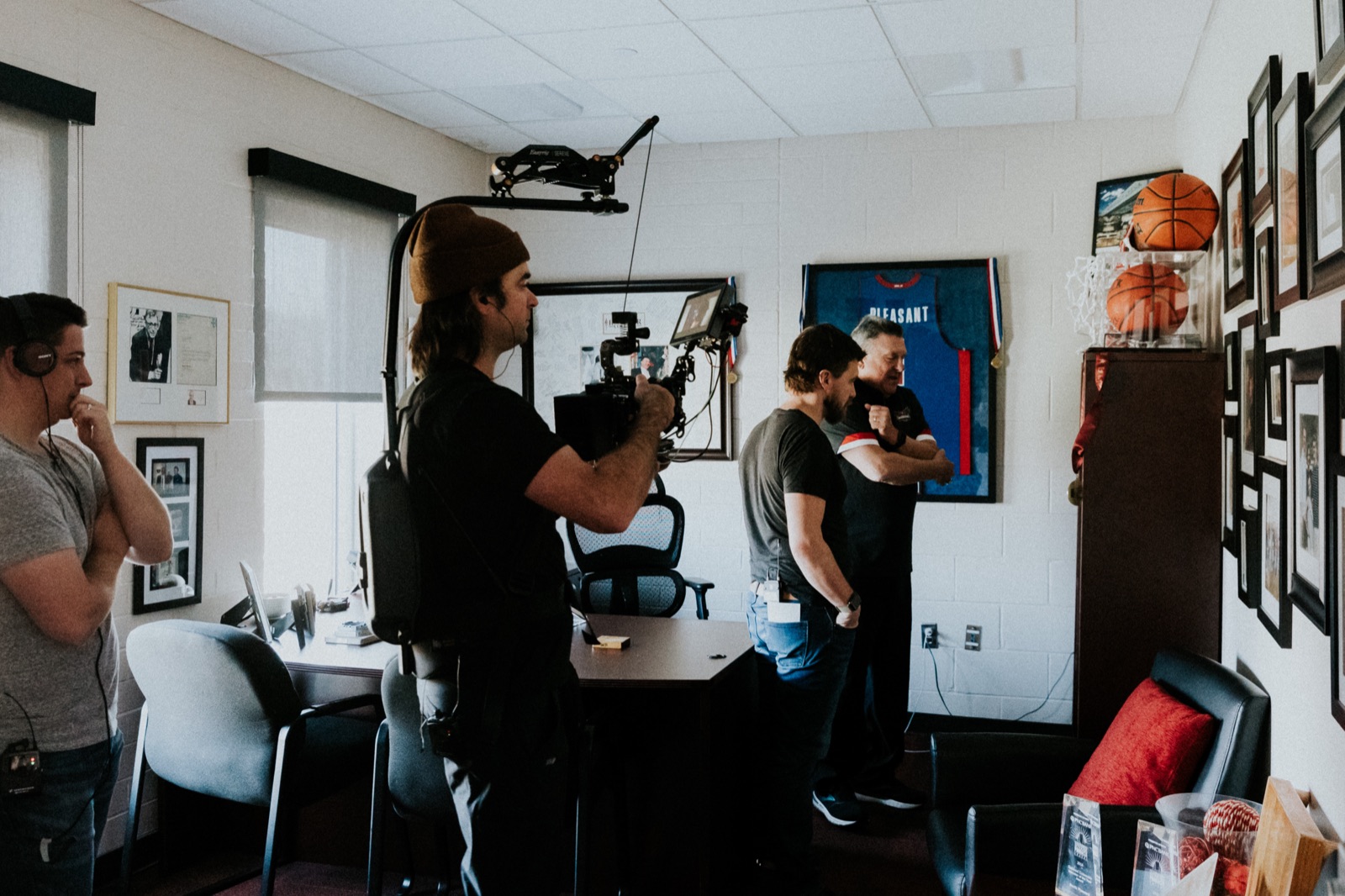 Filming Garth Pleasant in his office, surrounded by decades of memorabilia